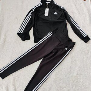 Women's Adidas Track Suit. Medium.